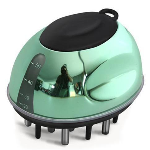 Green and black hair massager on a white background